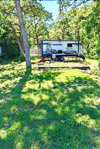 a view of a house with a big yard