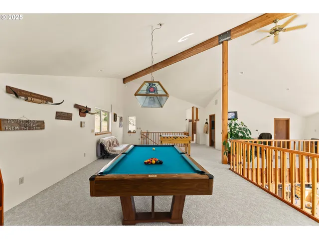 a room with furniture and view of bedroom