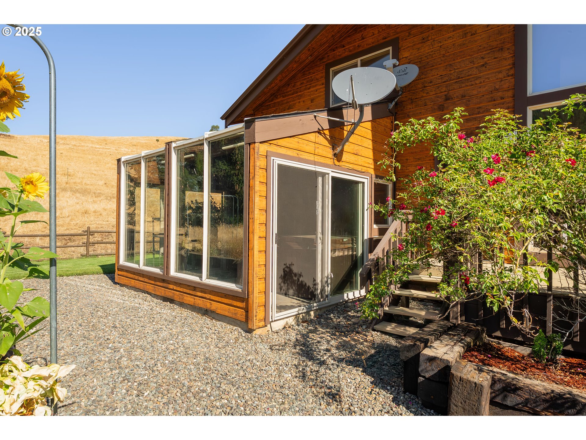 325 Beals Creek Road Canyonville, OR 97417 - Photo 30 of 47 a backyard of a house with table and chairs