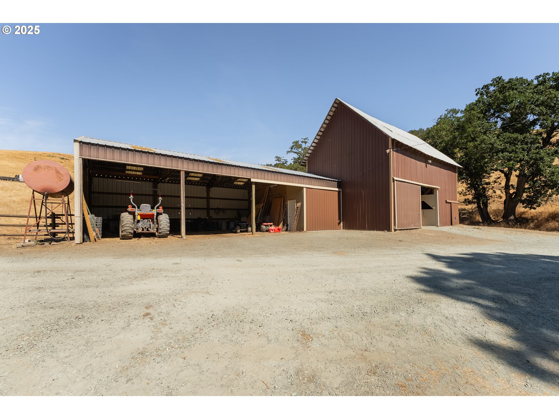 325 Beals Creek Road Canyonville, OR 97417 - Photo 37 of 47 a view of a house with a yard and garage