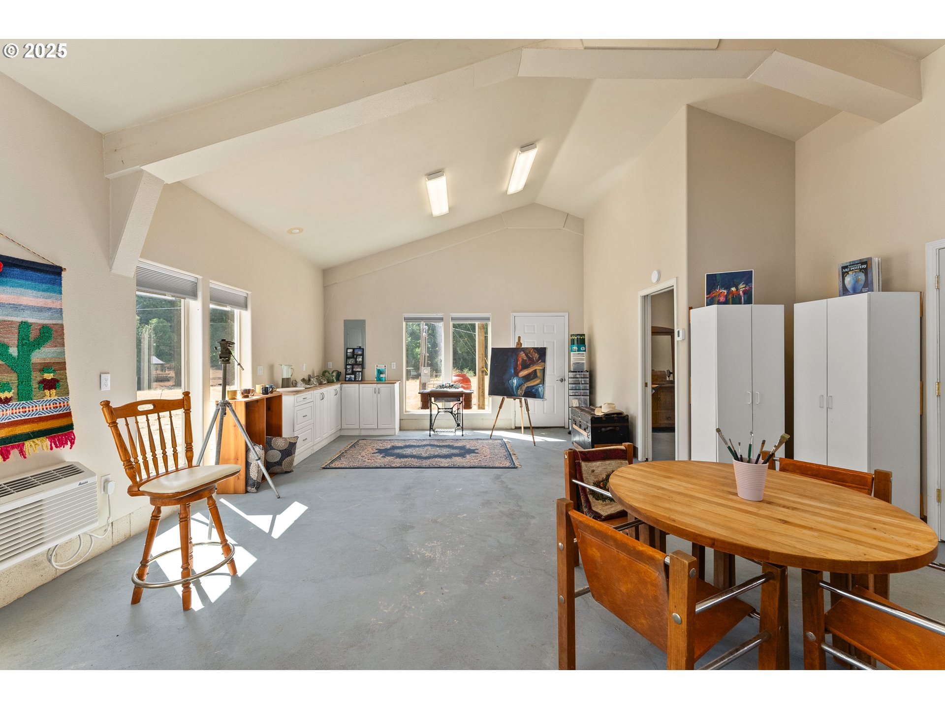 325 Beals Creek Road Canyonville, OR 97417 - Photo 42 of 47 a living room with furniture and a wooden floor