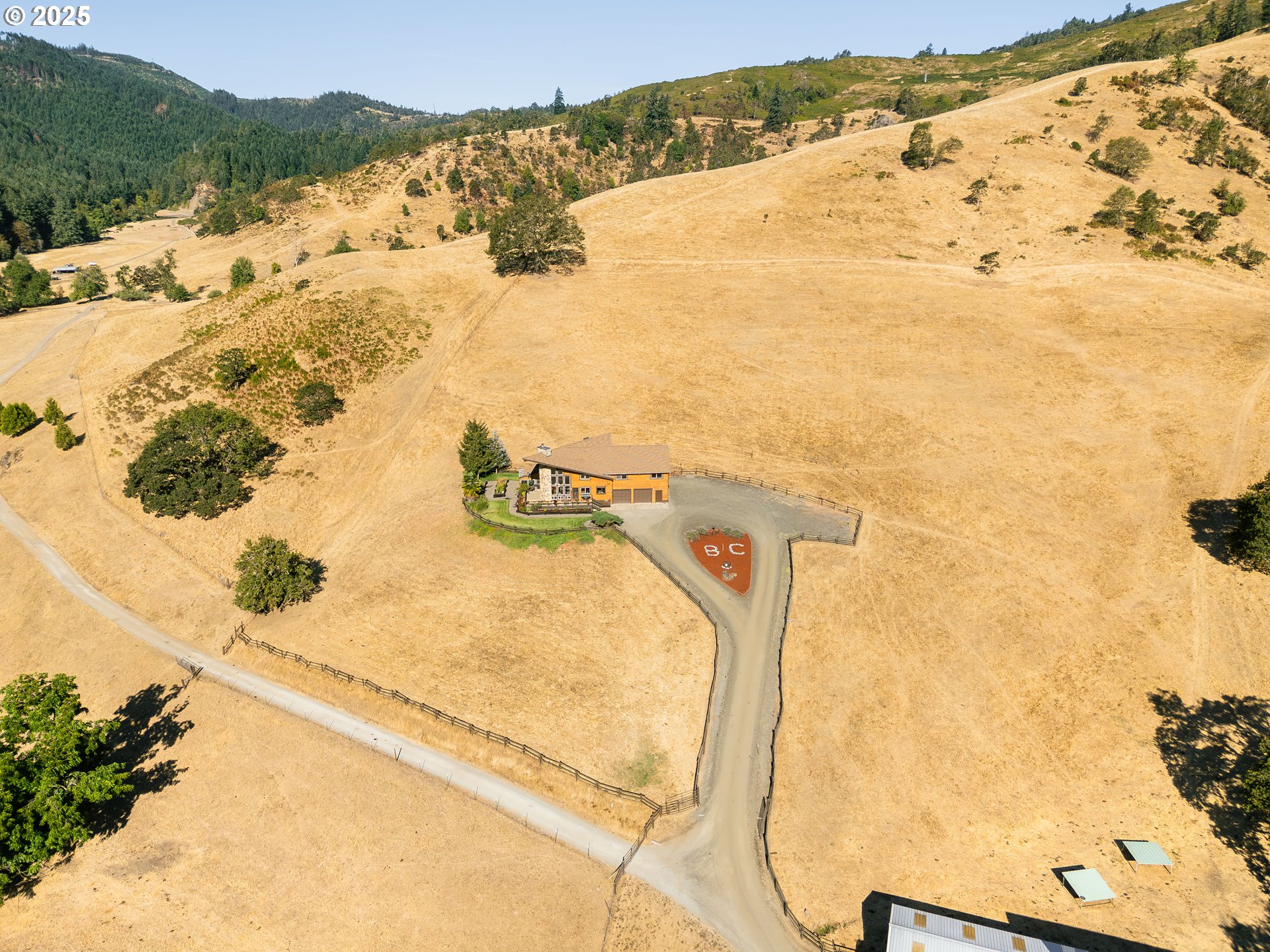 325 Beals Creek Road Canyonville, OR 97417 - Photo 46 of 47 a view of a swimming pool with a mountain