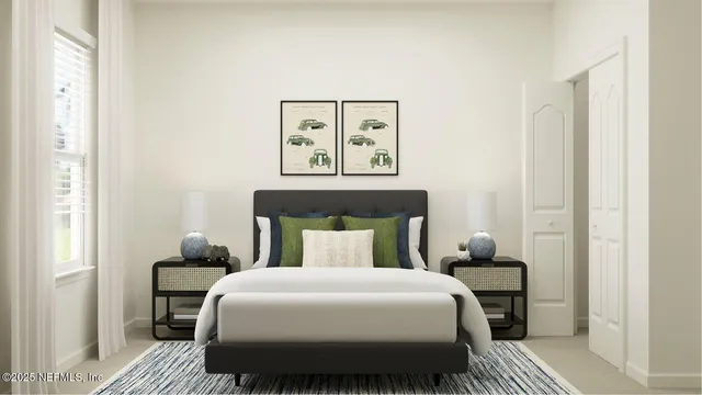 a living room with furniture and next to a window