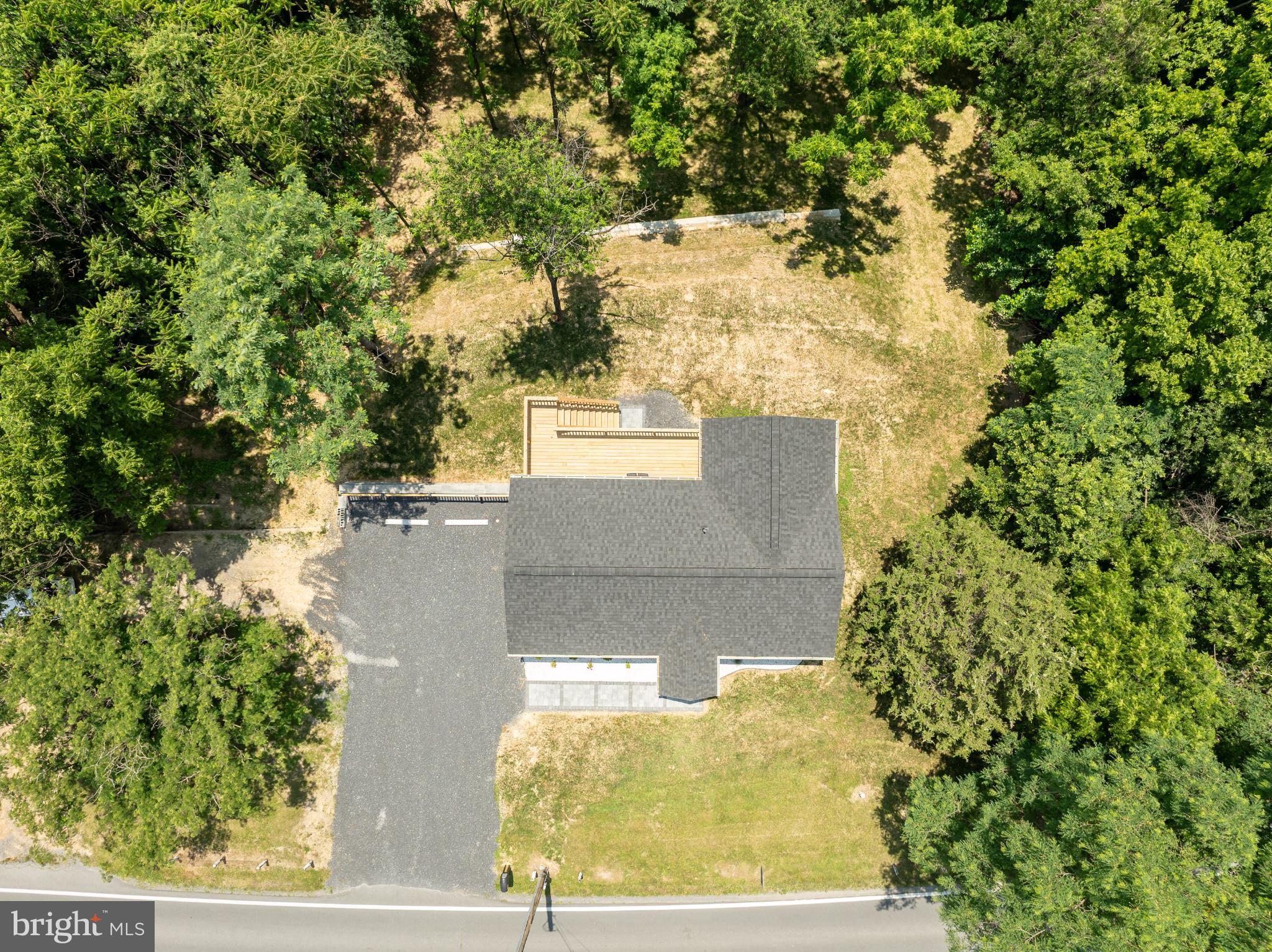 2968 Sulphur Springs Road Inwood, WV 25428 - Photo 24 of 65 Serene retreat nestled among lush greenery.