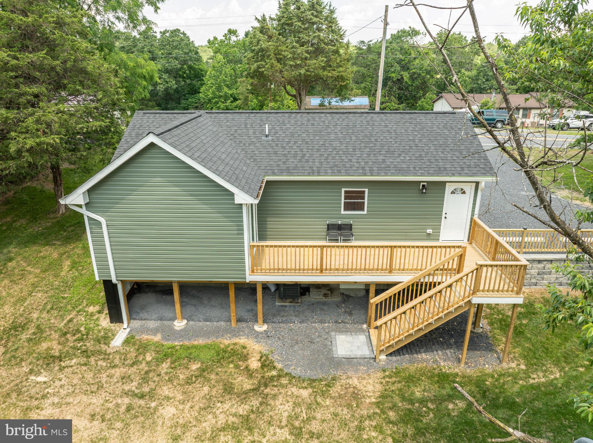 2968 Sulphur Springs Road Inwood, WV 25428 - Photo 34 of 65 Charming green home with inviting deck.