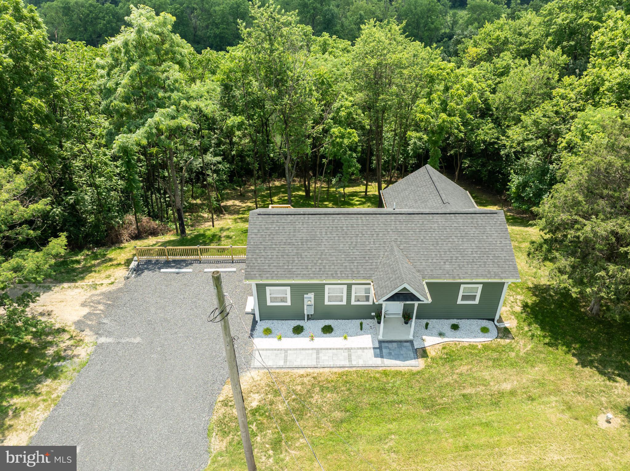 2968 Sulphur Springs Road Inwood, WV 25428 - Photo 36 of 65 Charming home nestled in lush greenery.
