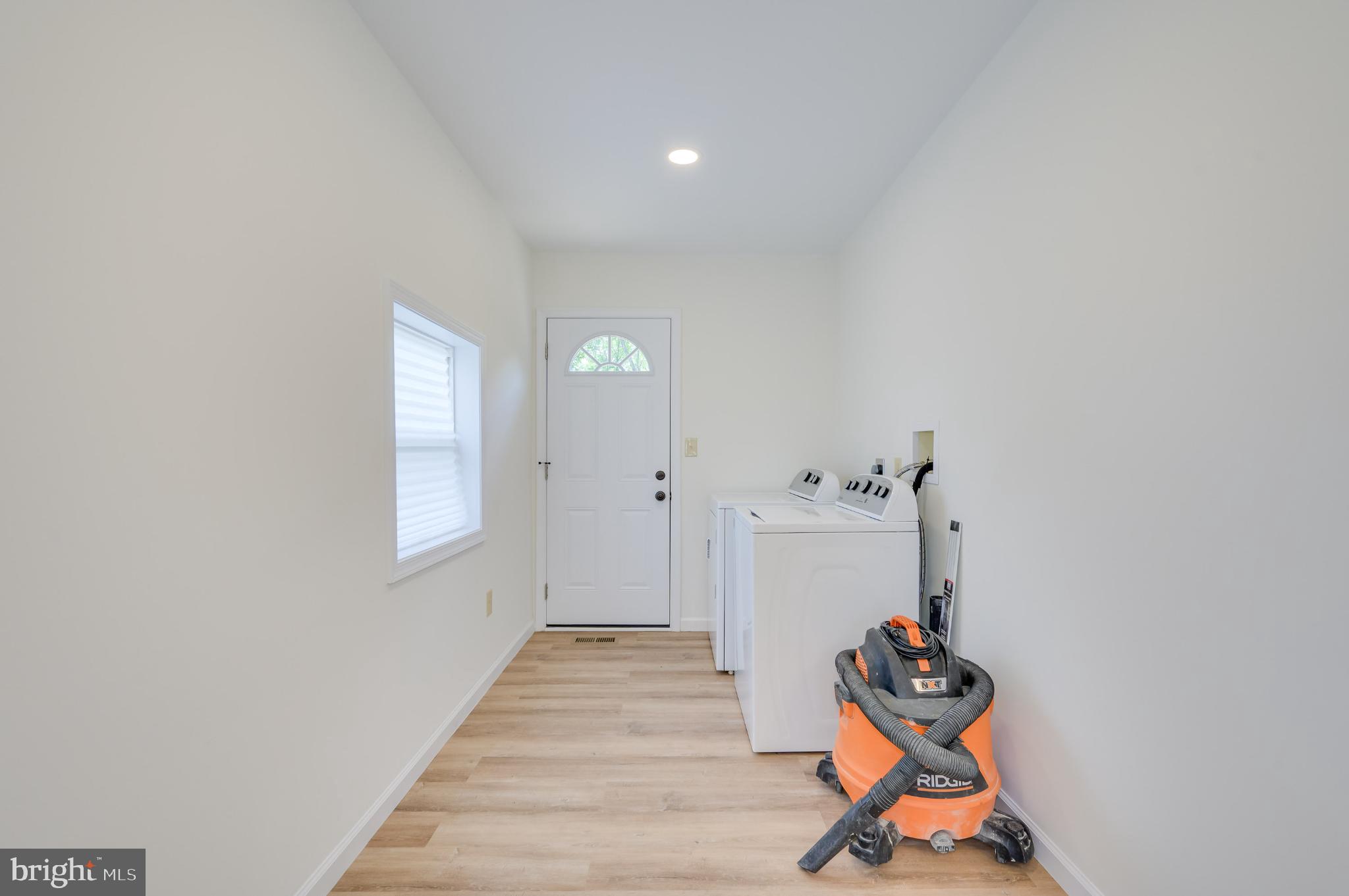 2968 Sulphur Springs Road Inwood, WV 25428 - Photo 40 of 65 Bright and airy laundry space with modern charm.