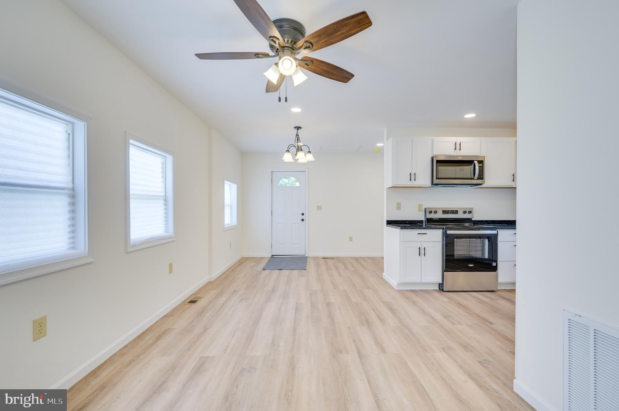 2968 Sulphur Springs Road Inwood, WV 25428 - Photo 48 of 65 Bright and airy open-concept living space.