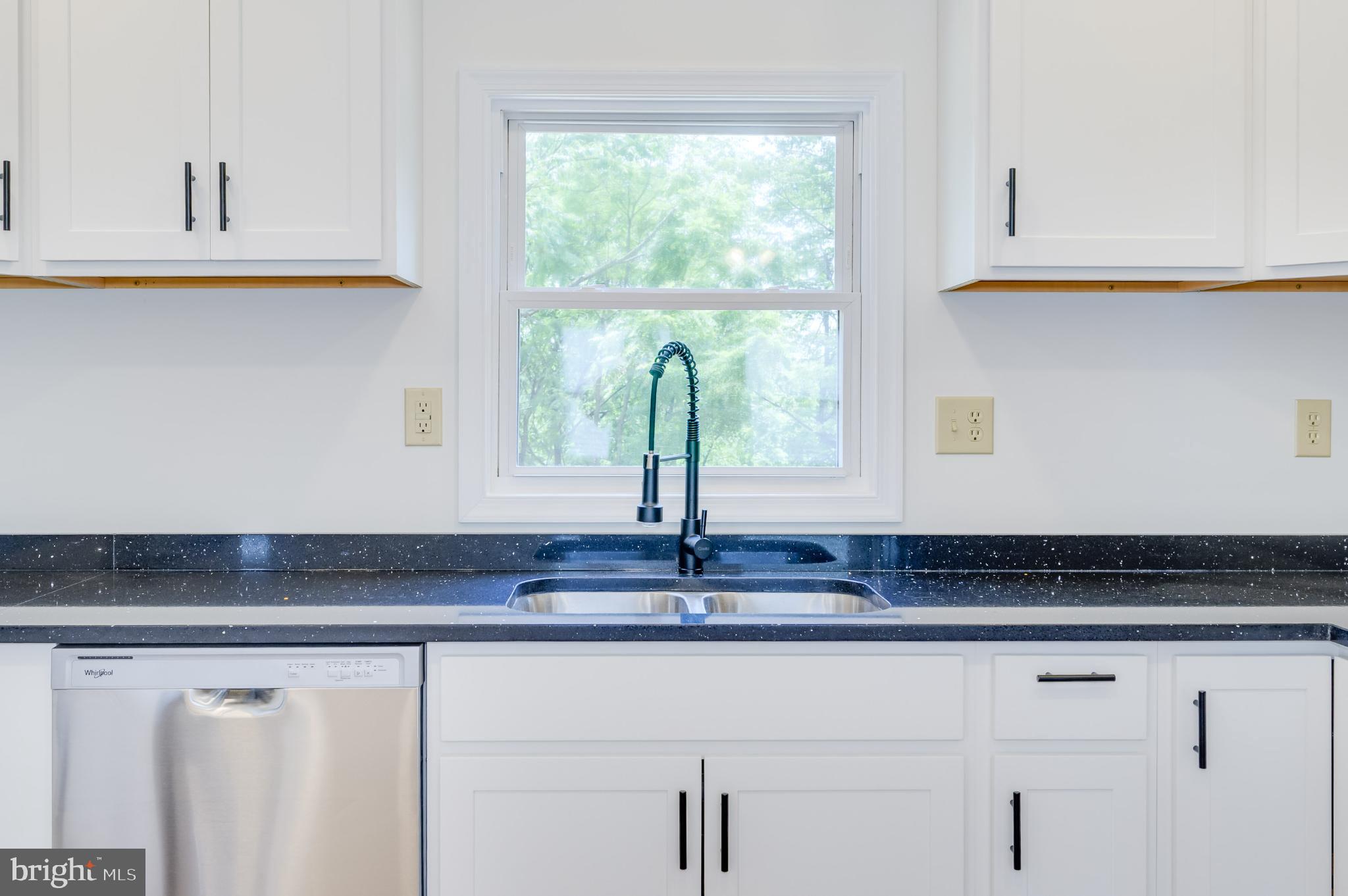 2968 Sulphur Springs Road Inwood, WV 25428 - Photo 53 of 65 Modern kitchen with sleek finishes.