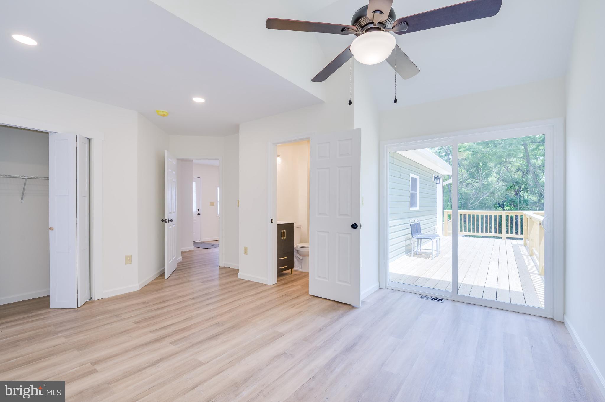 2968 Sulphur Springs Road Inwood, WV 25428 - Photo 58 of 65 Bright and airy space with outdoor access.