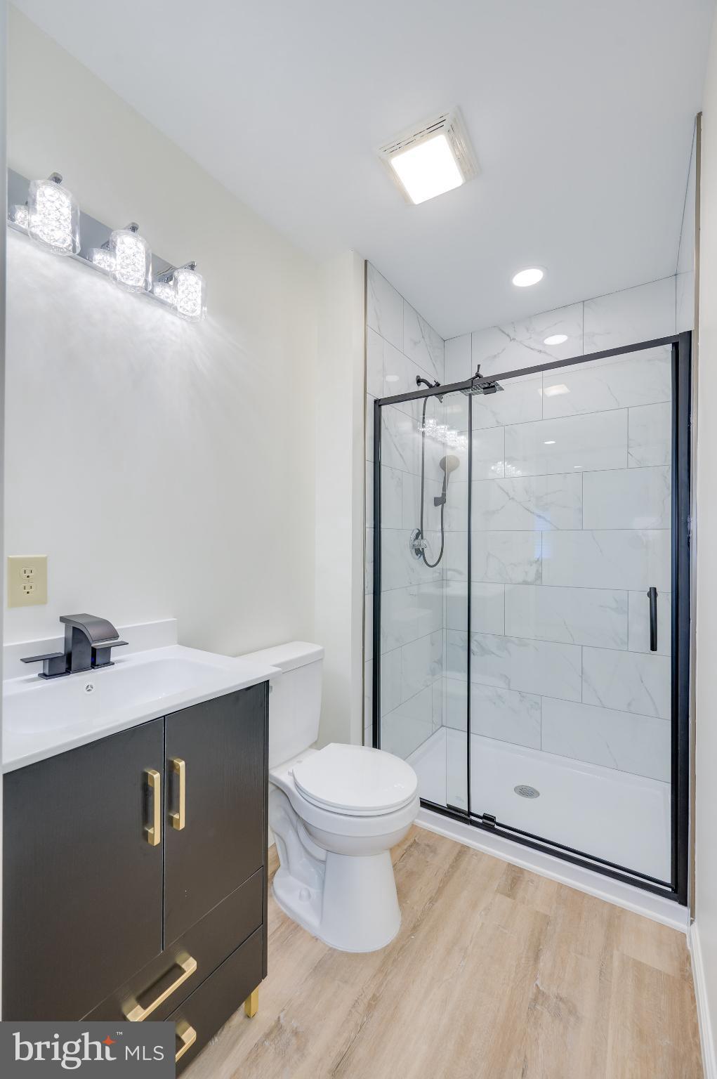 2968 Sulphur Springs Road Inwood, WV 25428 - Photo 61 of 65 Sleek modern bathroom with elegant finishes.