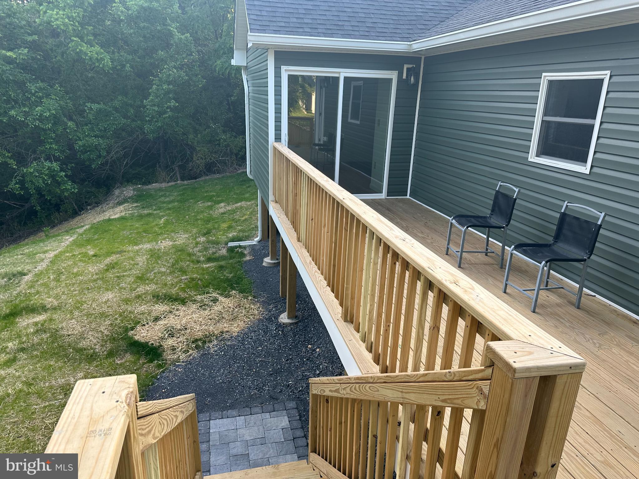 2968 Sulphur Springs Road Inwood, WV 25428 - Photo 64 of 65 Charming deck with serene backyard views.