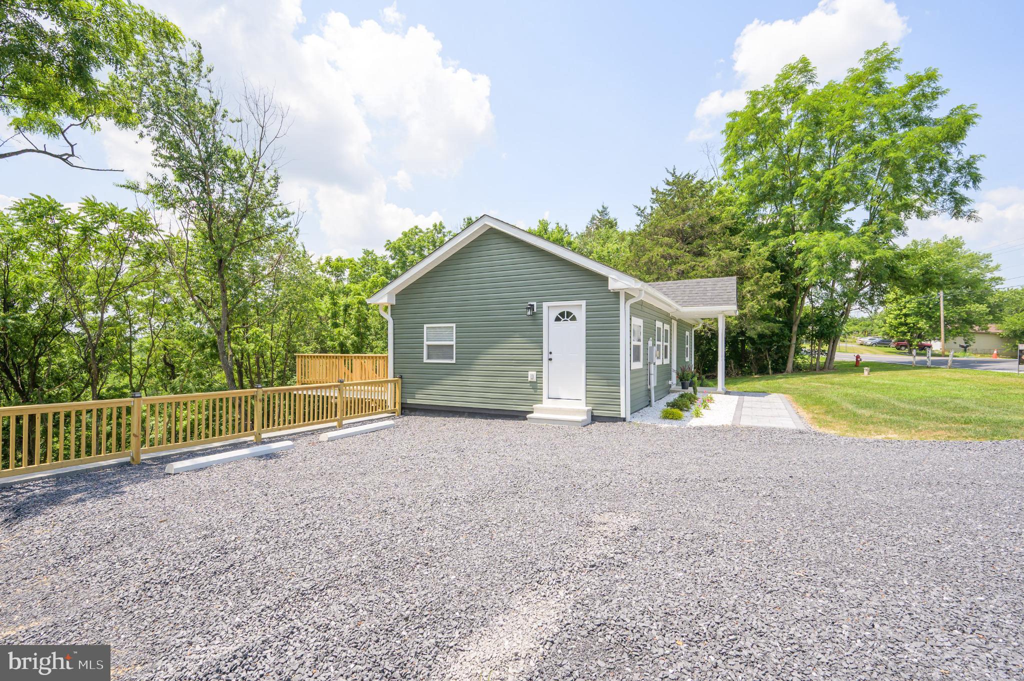 2968 Sulphur Springs Road Inwood, WV 25428 - Photo 9 of 65 Charming green home with scenic surroundings.
