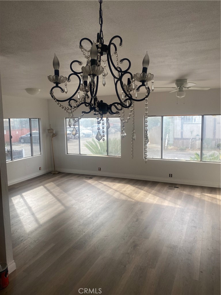 2250 West Mill Street, Unit 68 Colton, CA 92324 - Photo 11 of 12 a view of an empty room with windows