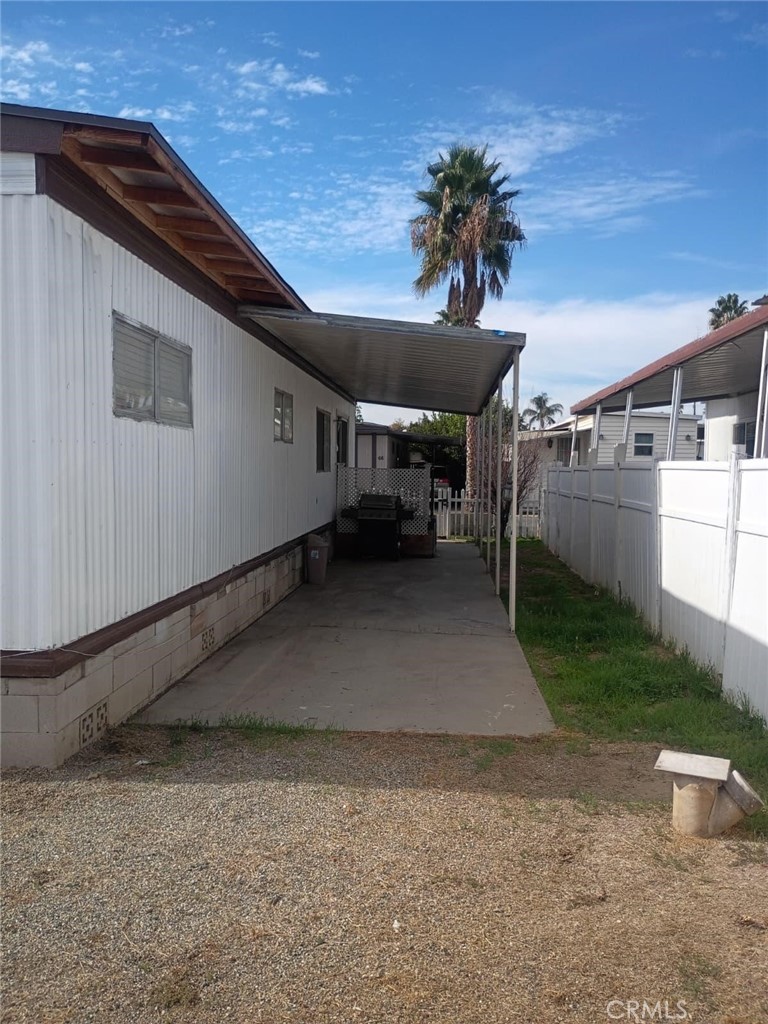 2250 West Mill Street, Unit 68 Colton, CA 92324 - Photo 4 of 12 a view of a house with a yard