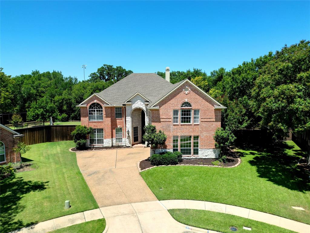 132 Rustic Meadow Way Coppell, TX 75019 - Photo 1 of 39 a aerial view of a house with a yard