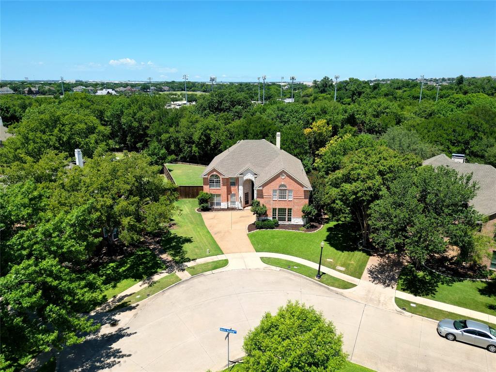 132 Rustic Meadow Way Coppell, TX 75019 - Photo 2 of 39 a view of a garden with houses