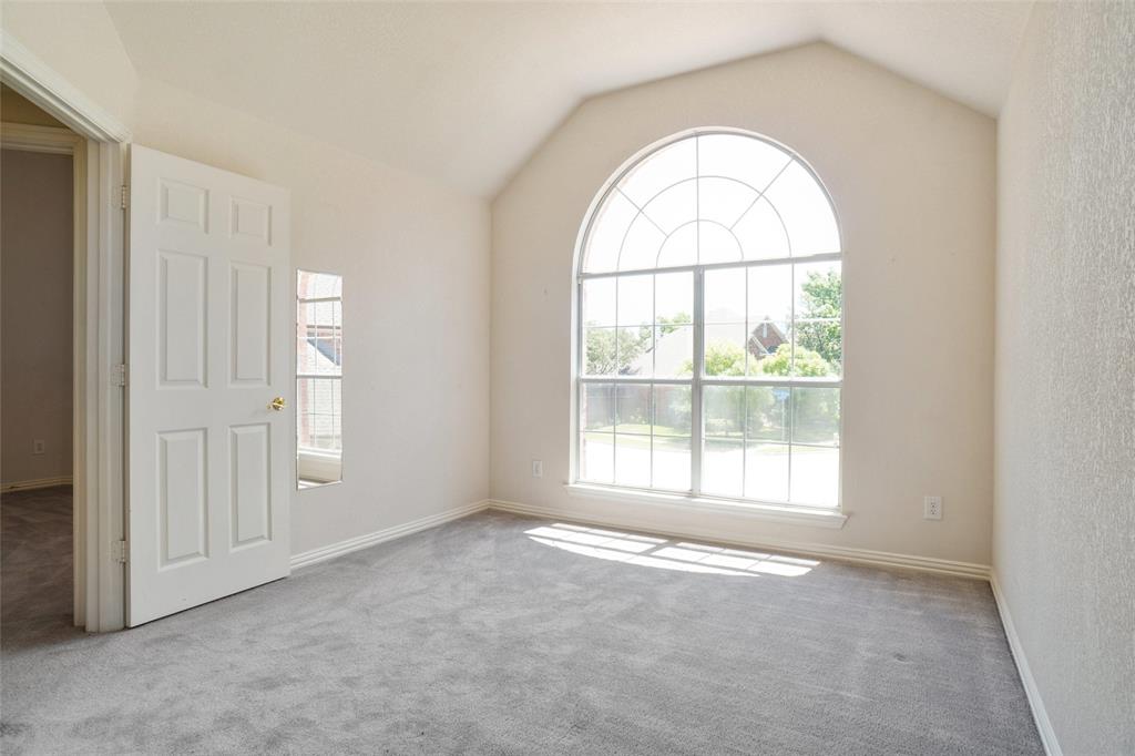 132 Rustic Meadow Way Coppell, TX 75019 - Photo 24 of 39 an empty room with a window