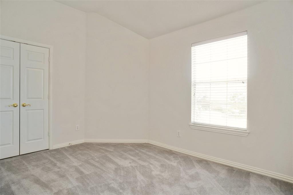 132 Rustic Meadow Way Coppell, TX 75019 - Photo 25 of 39 an empty room with a window