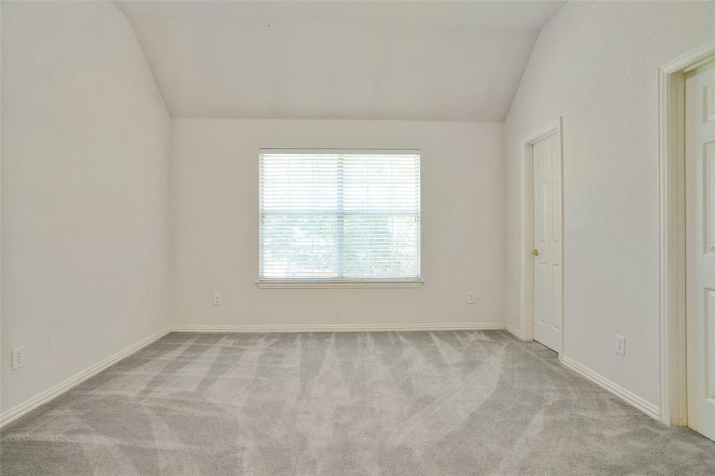 132 Rustic Meadow Way Coppell, TX 75019 - Photo 26 of 39 an empty room with a window