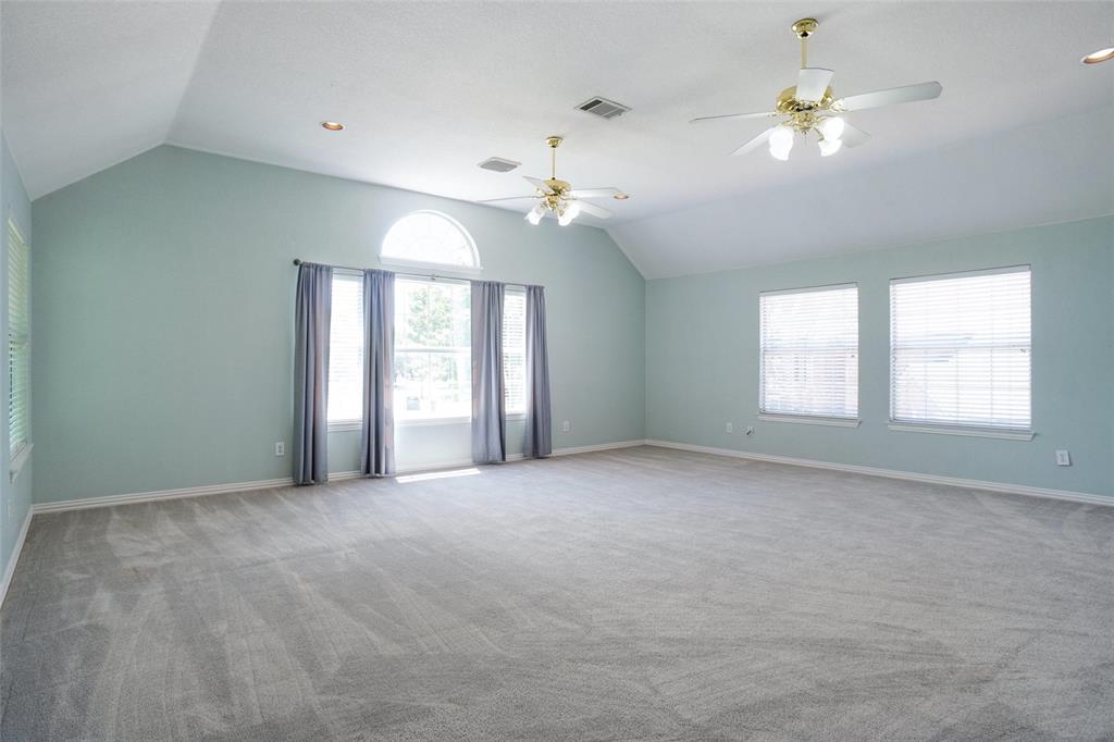 132 Rustic Meadow Way Coppell, TX 75019 - Photo 29 of 39 a view of an empty room with a window