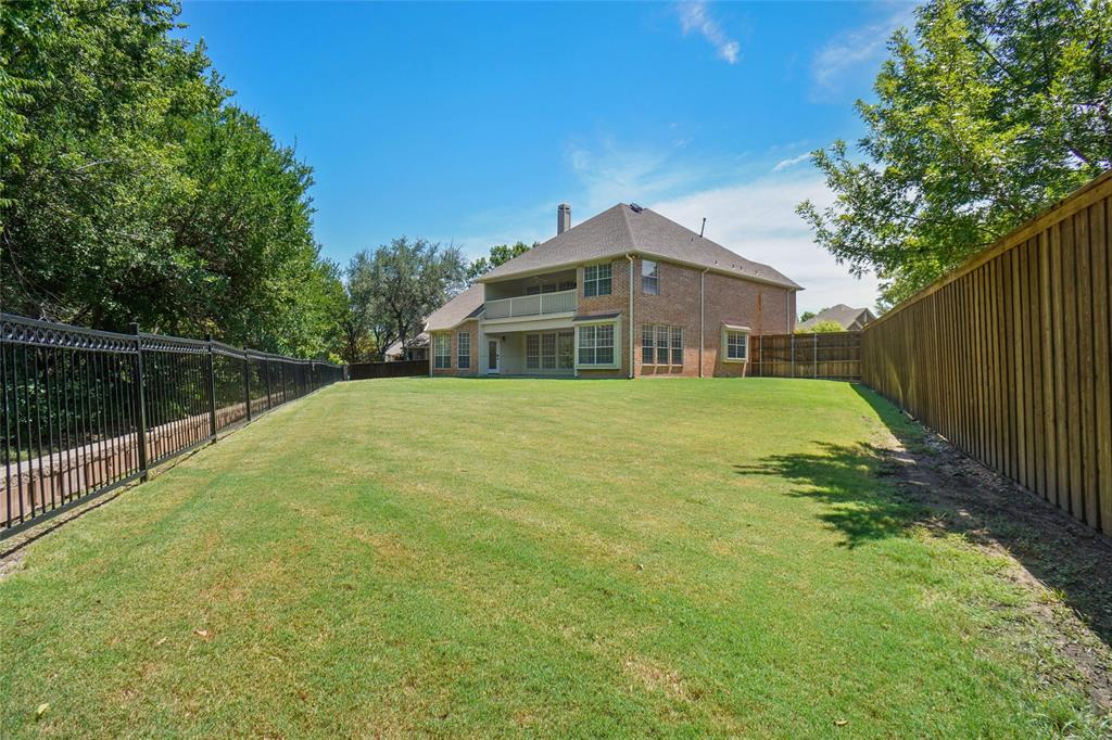 132 Rustic Meadow Way Coppell, TX 75019 - Photo 31 of 39 a view of a house with a yard