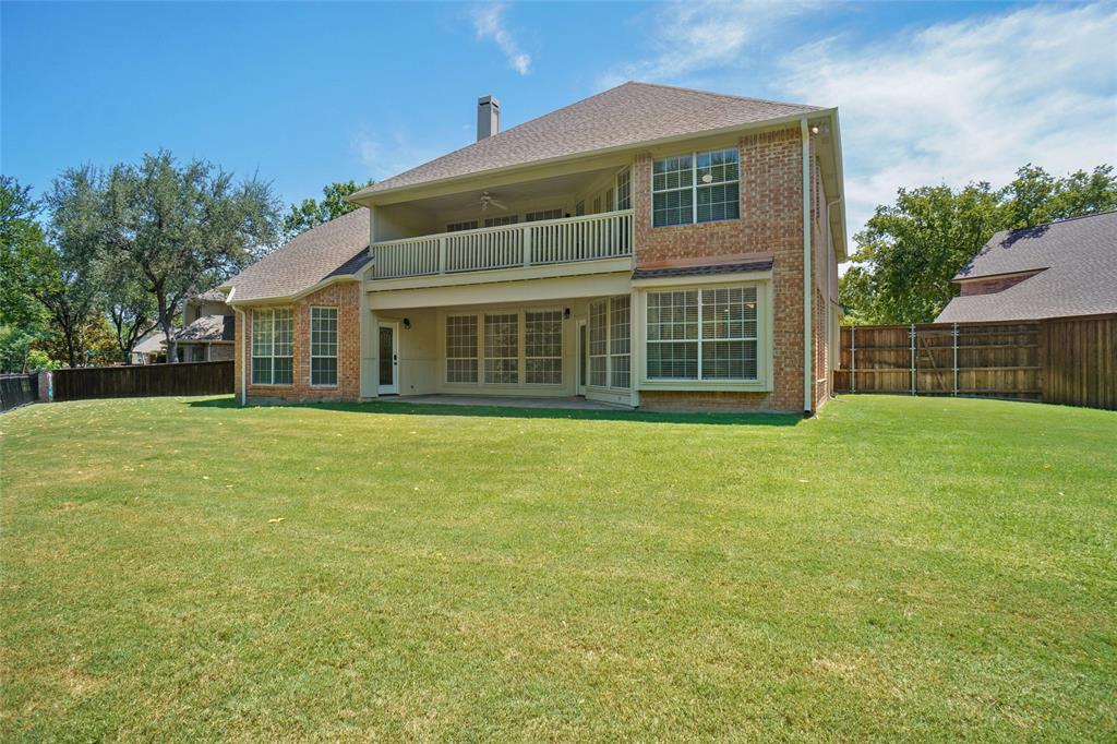 132 Rustic Meadow Way Coppell, TX 75019 - Photo 35 of 39 a front view of a house with a garden