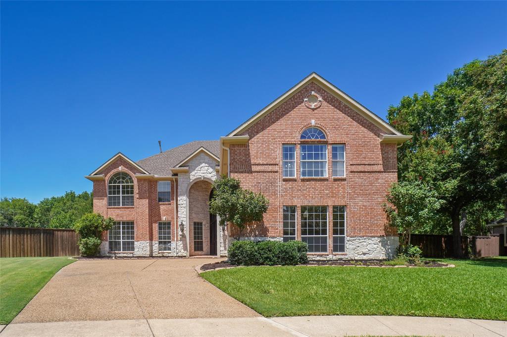 132 Rustic Meadow Way Coppell, TX 75019 - Photo 38 of 39 a front view of a house with a yard and garage