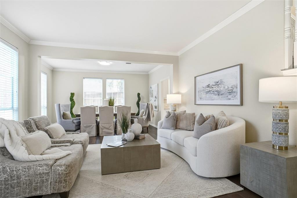 132 Rustic Meadow Way Coppell, TX 75019 - Photo 6 of 39 a living room with furniture and a large window