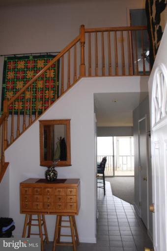 6608 River Drive Road Sparrows Point, MD 21219 - Photo 2 of 16 a view of entryway and hall with wooden floor