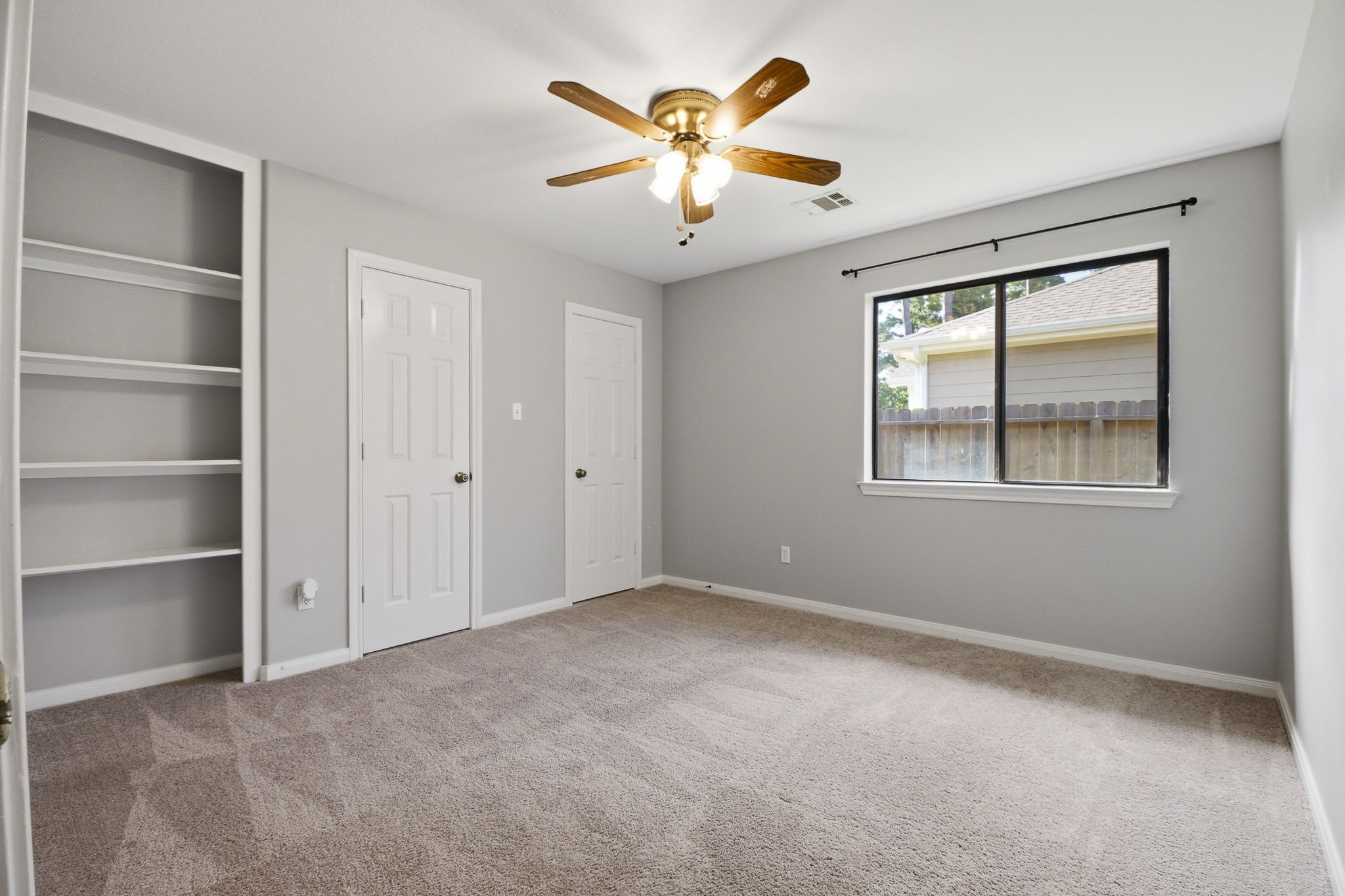12557 Marina Loop Willis, TX 77318 - Photo 16 of 36 One of the secondary bedrooms