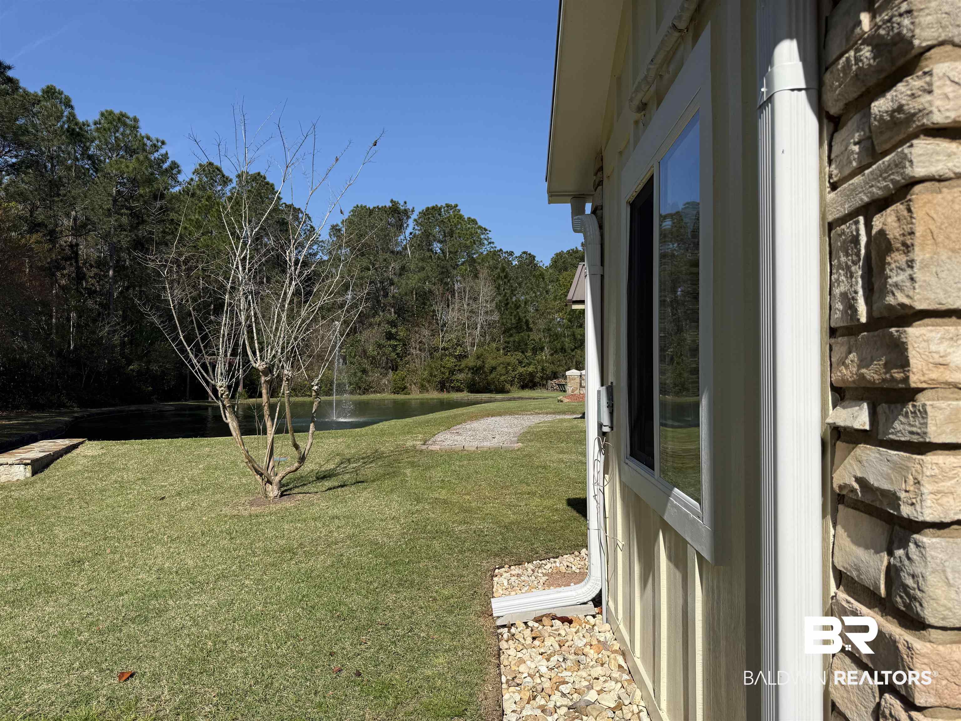 28114 Preserve Trail, Unit 190 Elberta, AL 36530 - Photo 15 of 69 View of green lawn featuring a water view and view of wooded area