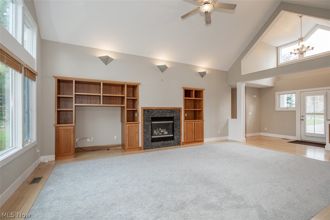 7282 Holzhauer Road Northfield, OH 44067 - Photo 6 of 47 Living room with gas fireplace and built-ins