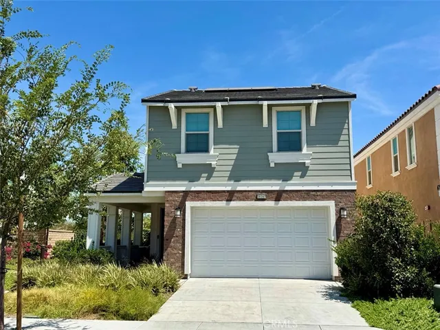 a view of house with outdoor space