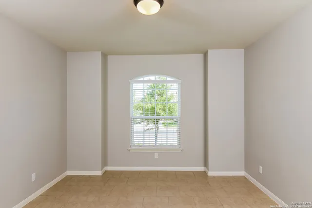a view of a room with a window
