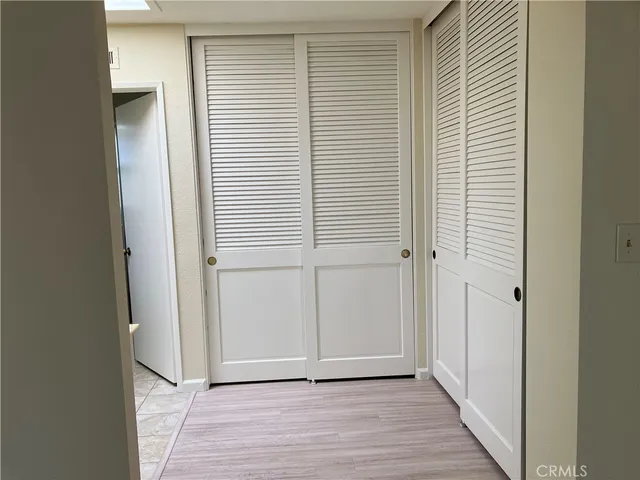a view of a livingroom with wooden floor