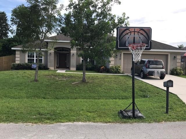 570 Southwest Ryder Road Port St. Lucie, FL 34953 - Photo 2 of 35 Front