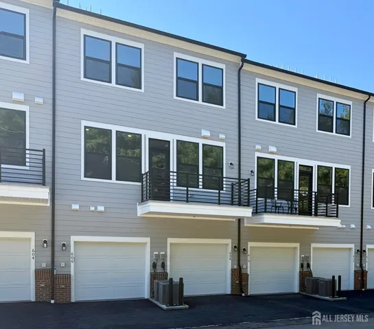 a view of a house with a sitting area