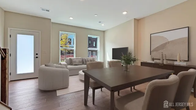 a living room with furniture and a table