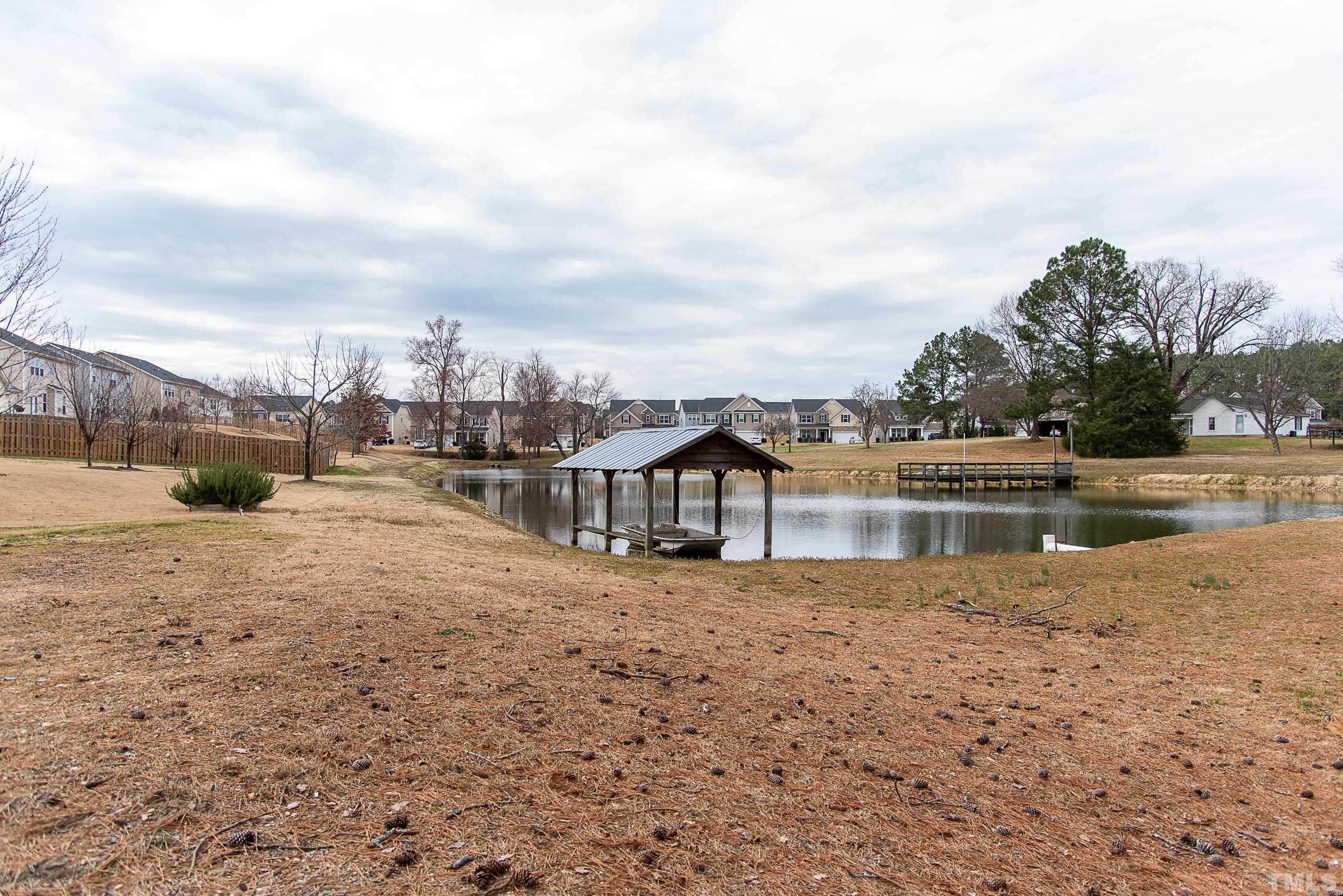 612 Hope Valley Road Knightdale, NC 27545 - Photo 17 of 56 a view of a lake with a big yard
