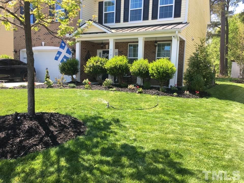 612 Hope Valley Road Knightdale, NC 27545 - Photo 3 of 56 a front view of a house with garden