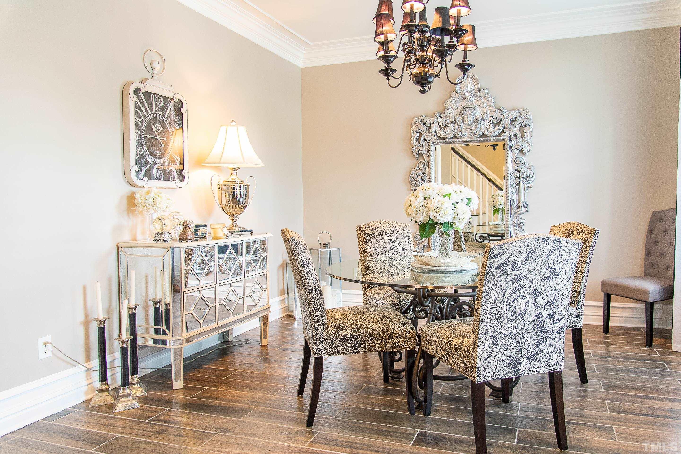 612 Hope Valley Road Knightdale, NC 27545 - Photo 36 of 56 a view of a dining room with furniture and wooden floor