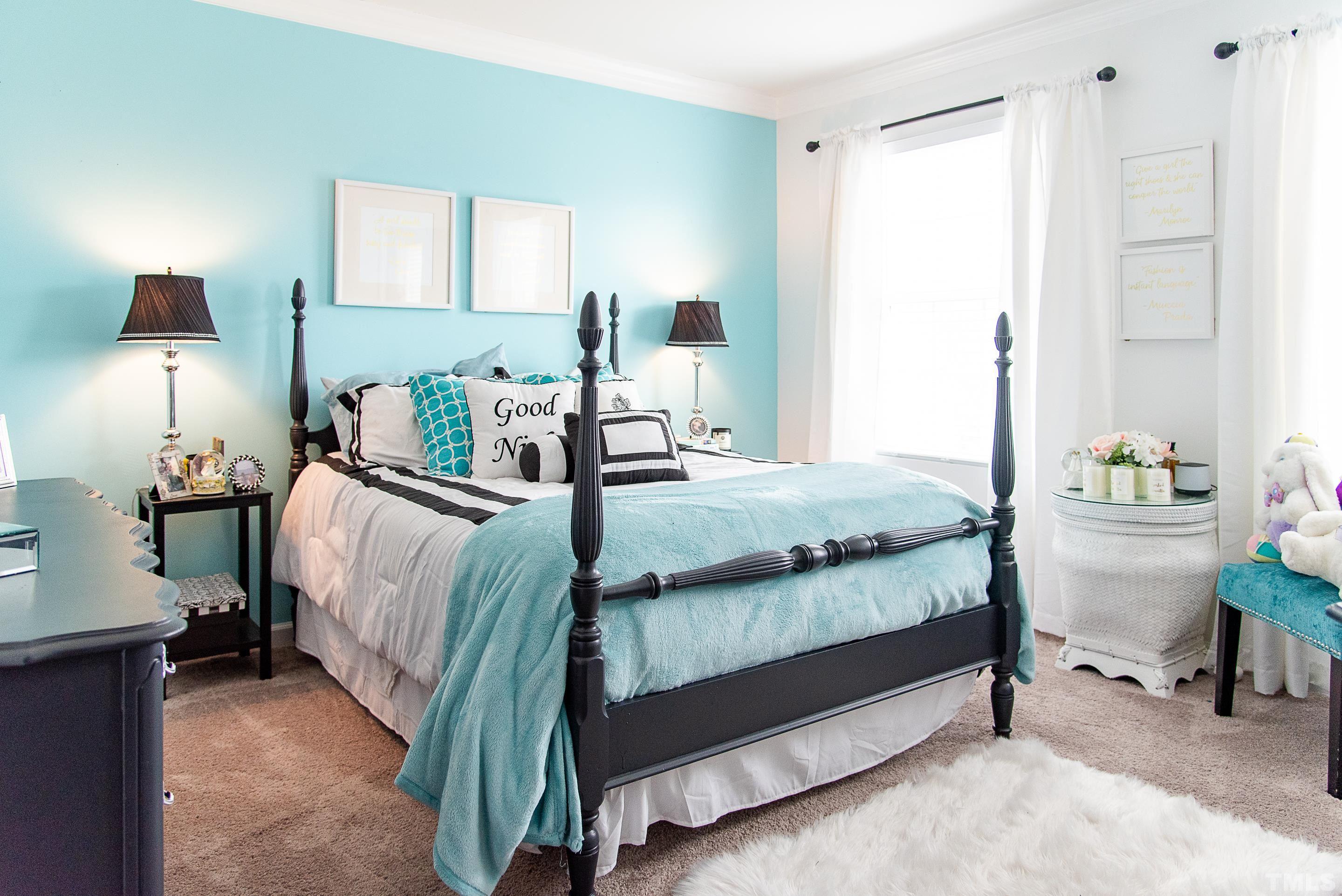 612 Hope Valley Road Knightdale, NC 27545 - Photo 41 of 56 a bedroom with a bed and a table in it