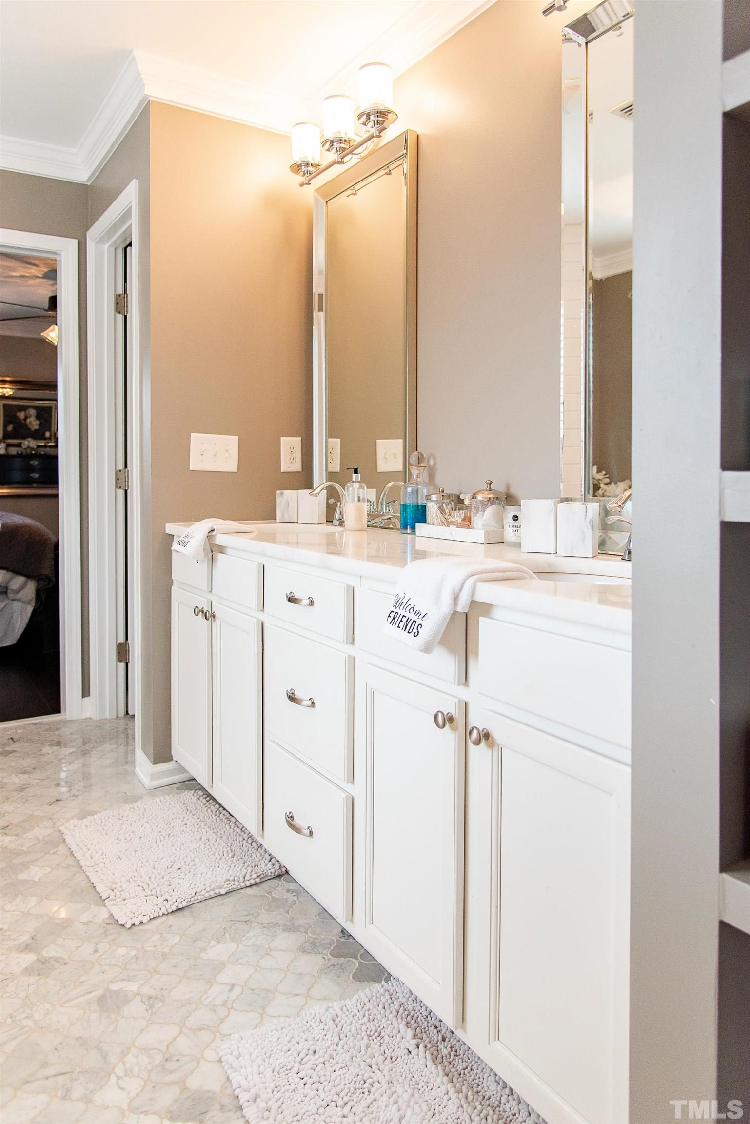 612 Hope Valley Road Knightdale, NC 27545 - Photo 50 of 56 a bathroom with a double vanity sink mirror and double