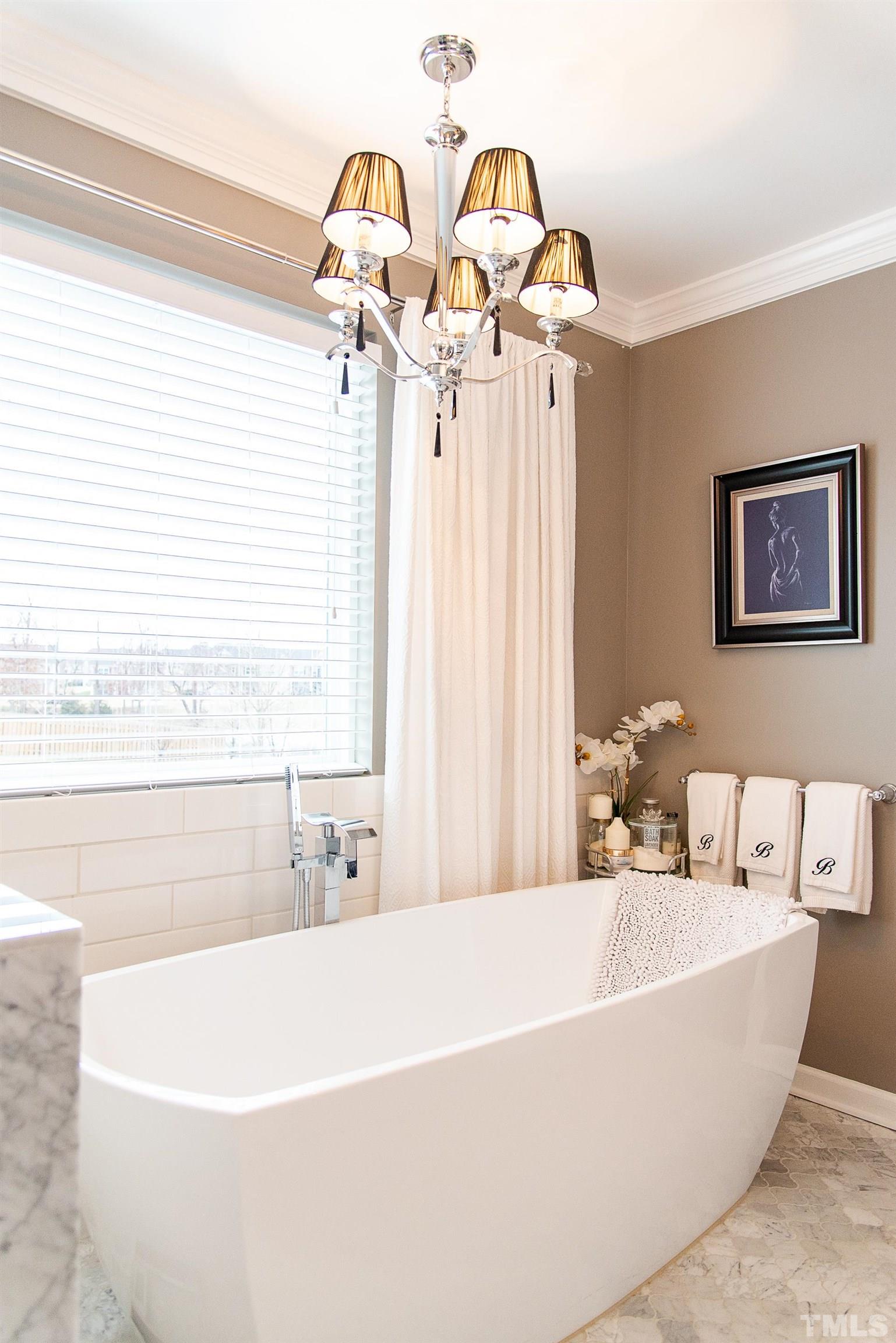612 Hope Valley Road Knightdale, NC 27545 - Photo 51 of 56 a white bath tub sitting next to a white sink