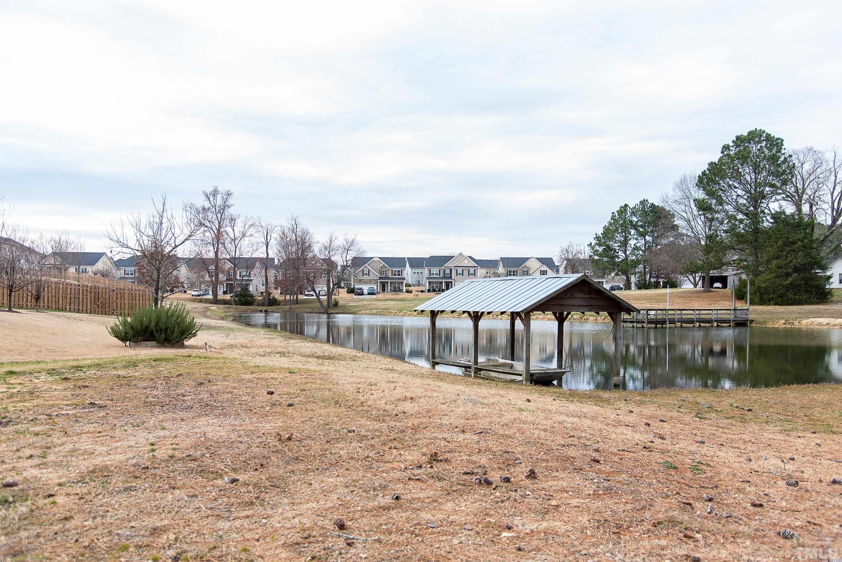 612 Hope Valley Road Knightdale, NC 27545 - Photo 9 of 56 a view of residential houses with lake view