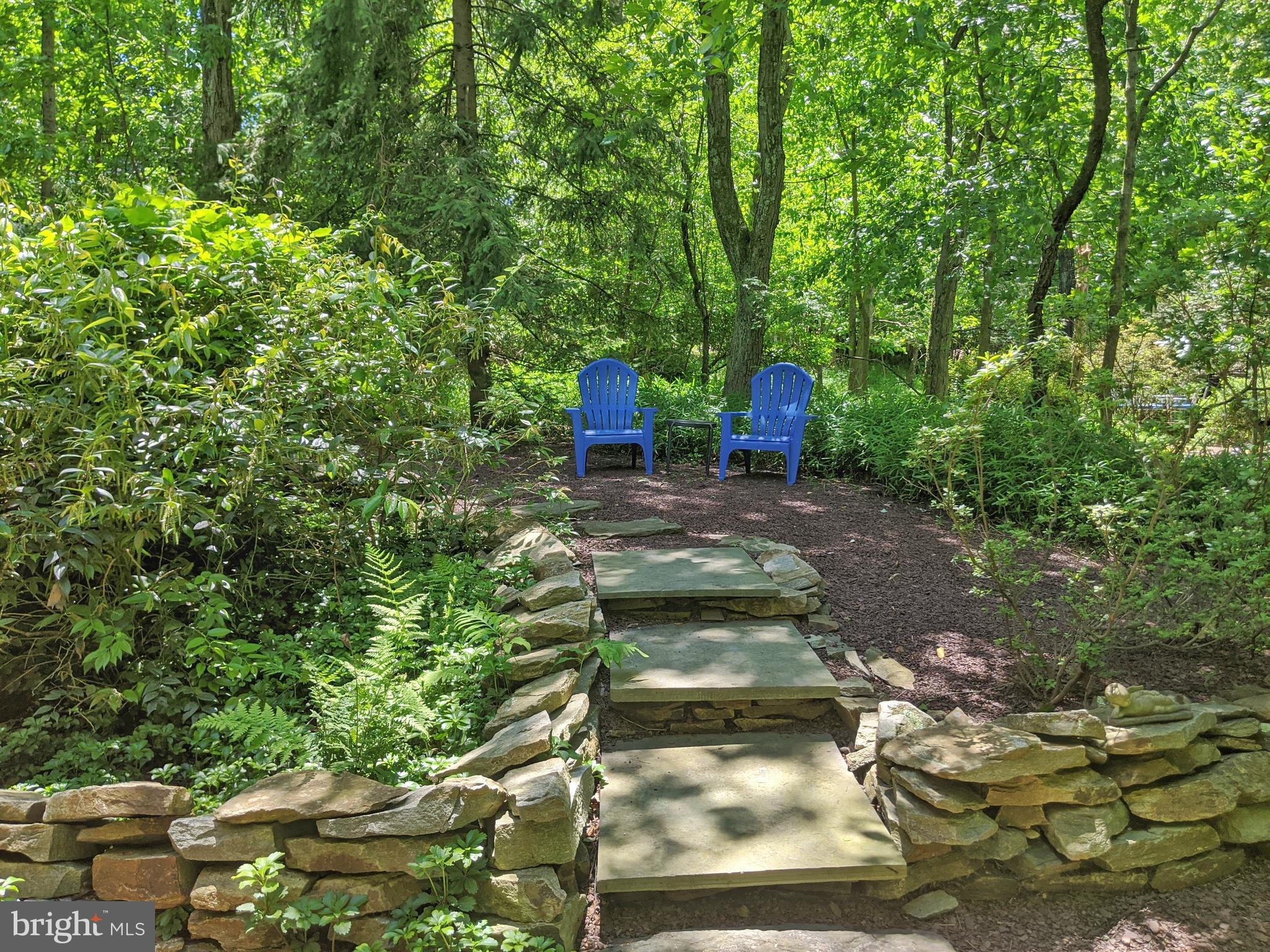 102 Jacobs Creek Road Ewing, NJ 08628 - Photo 45 of 51 Side yard w/ stone retaining walls & sitting area