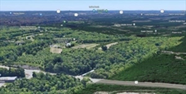 246 Worcester Road Charlton, MA 01507 - Photo 11 of 18 a view of a big yard with lots of green space and mountain view