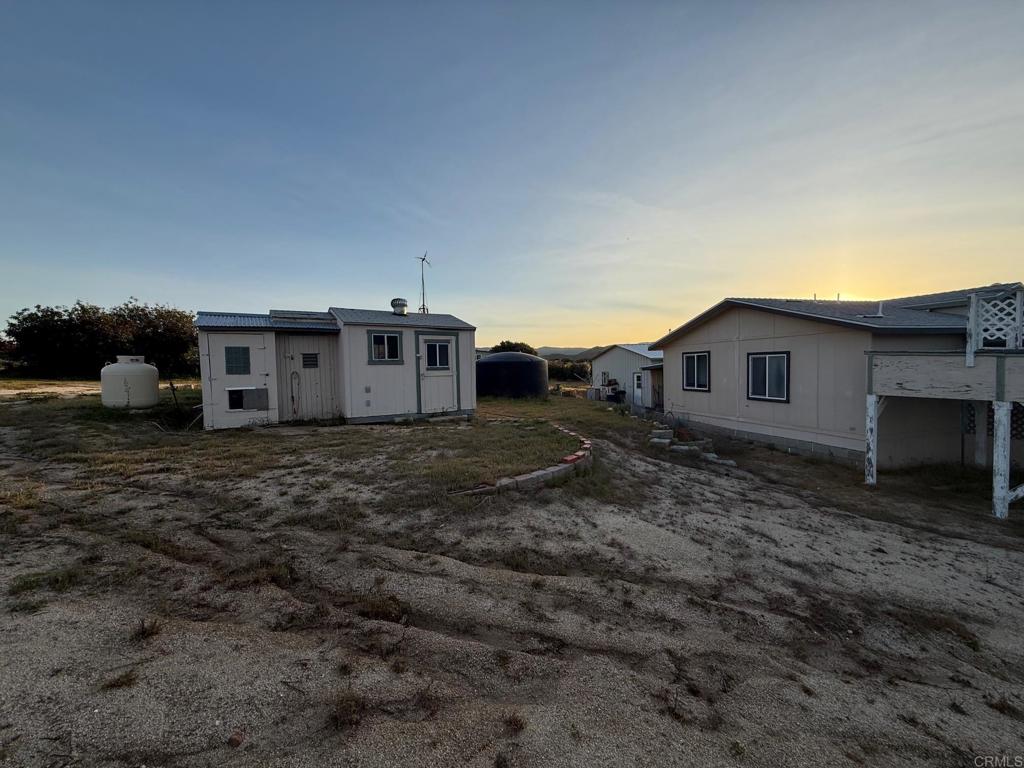 37697 Montezuma Valley Road Ranchita, CA 92066 - Photo 32 of 47 a view of a house with a yard