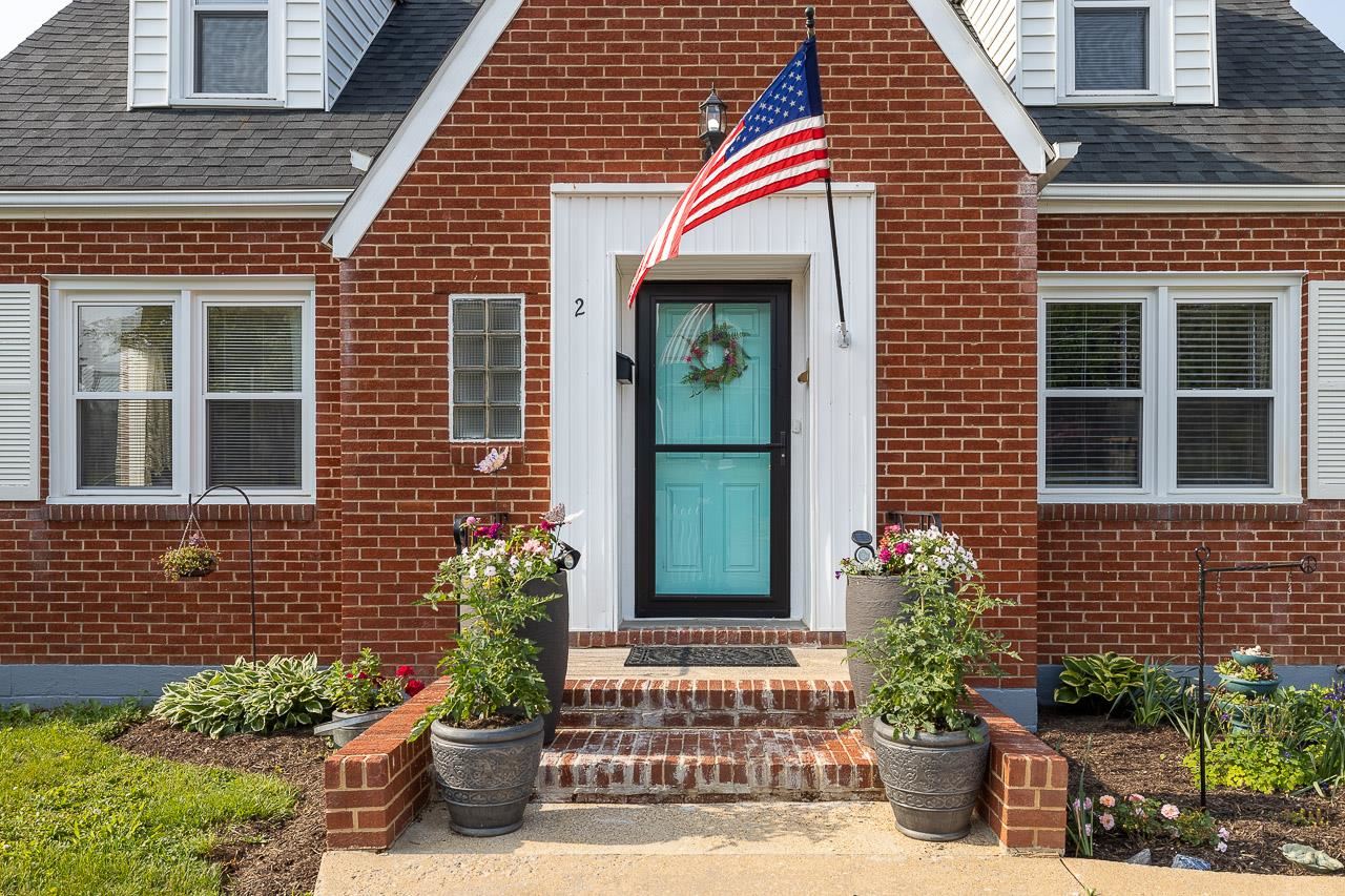 2 Terrace Lane Luray, VA 22835 - Photo 2 of 37 a view of a brick house with potted plants